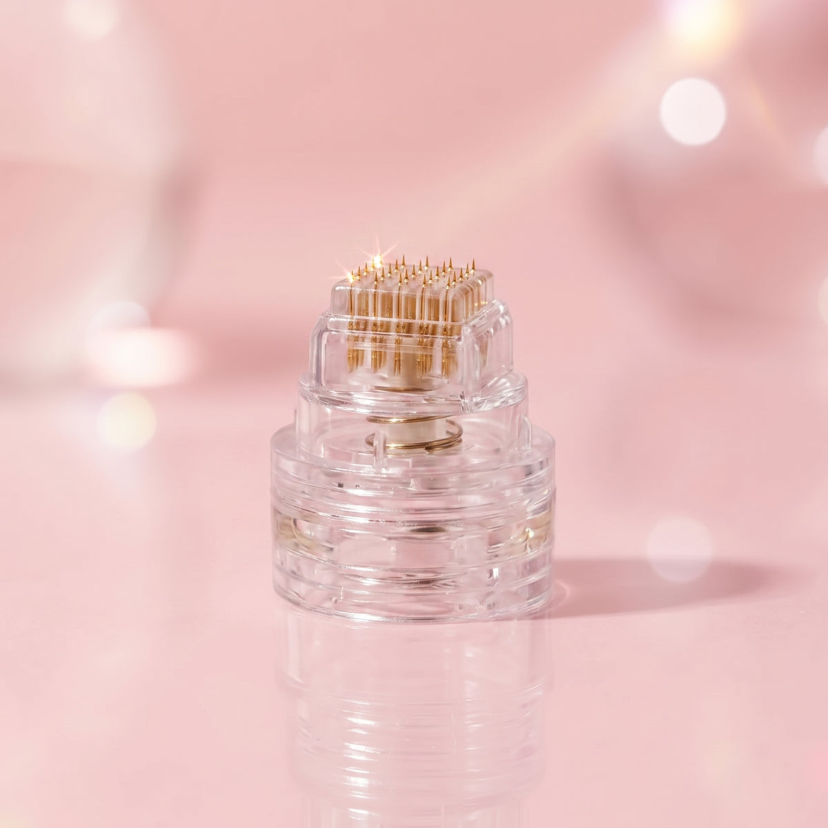 Close-up of the MicroInfuser microneedle head with gold-plated needles attached to a Syntha-Pep ampoule Close-up of the MicroInfuser microneedle head with gold-plated needles attached to a Syntha-Pep ampoule