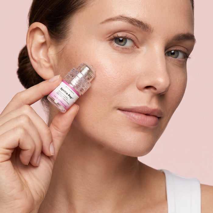 Applicator head flat on the cheek at 90 degrees, tap and lift