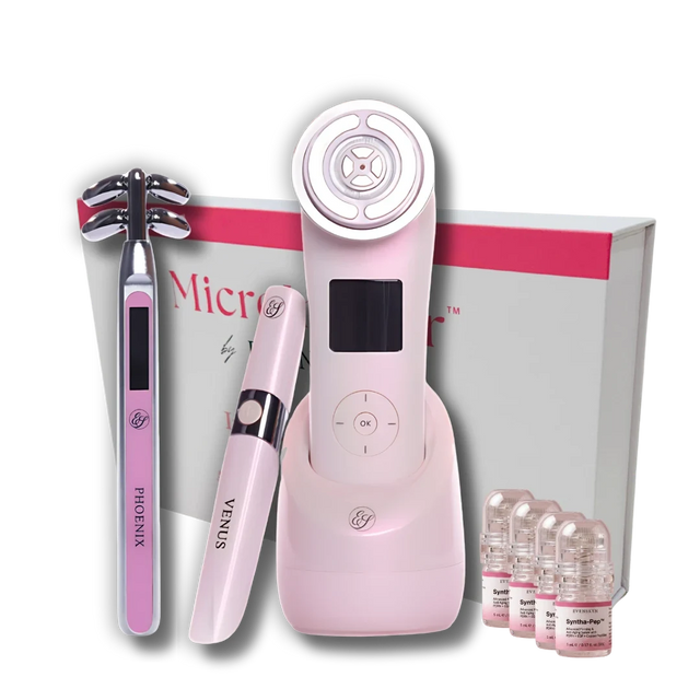 Prize 1: Lumo handset in its pink charging dock, Venus eye device, Phoenix microcurrent bar and MicroInfuser kit with four Syntha-Pep serum vials, in front of the MicroInfuser box